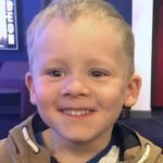 little boy excited at the cinema