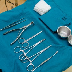 Surgeon and Surgical instruments in operation.