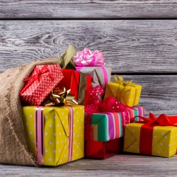 Large old bag with Christmas presents. New Years is soon. Merry Christmas.