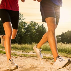 Legs View Of A Couple Jogging Outdoor in the Park