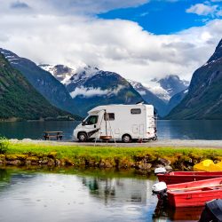 Family vacation travel RV, holiday trip in motorhome, Caravan car Vacation. Beautiful Nature Norway natural landscape.