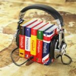 Learning languages online. Audiobooks concept. Books and headphones on the map world. 3d